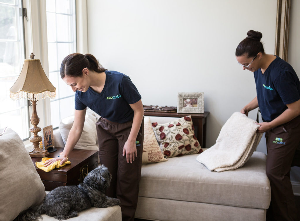 Two maids performing cleaning services in Alpharetta.