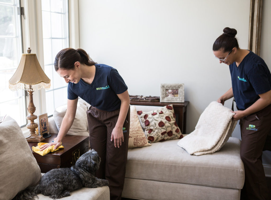 Two maids performing cleaning services in Houston.